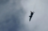 Một chiến đấu cơ MiG-23 do Nga chế tạo bay ở Syria vào ngày 20/02/2018. (Ảnh: Amer Almohibany/AFP qua Getty Images)
